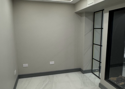 Luxury small room painting in London – modern interior finish by Eliot Painting Ltd